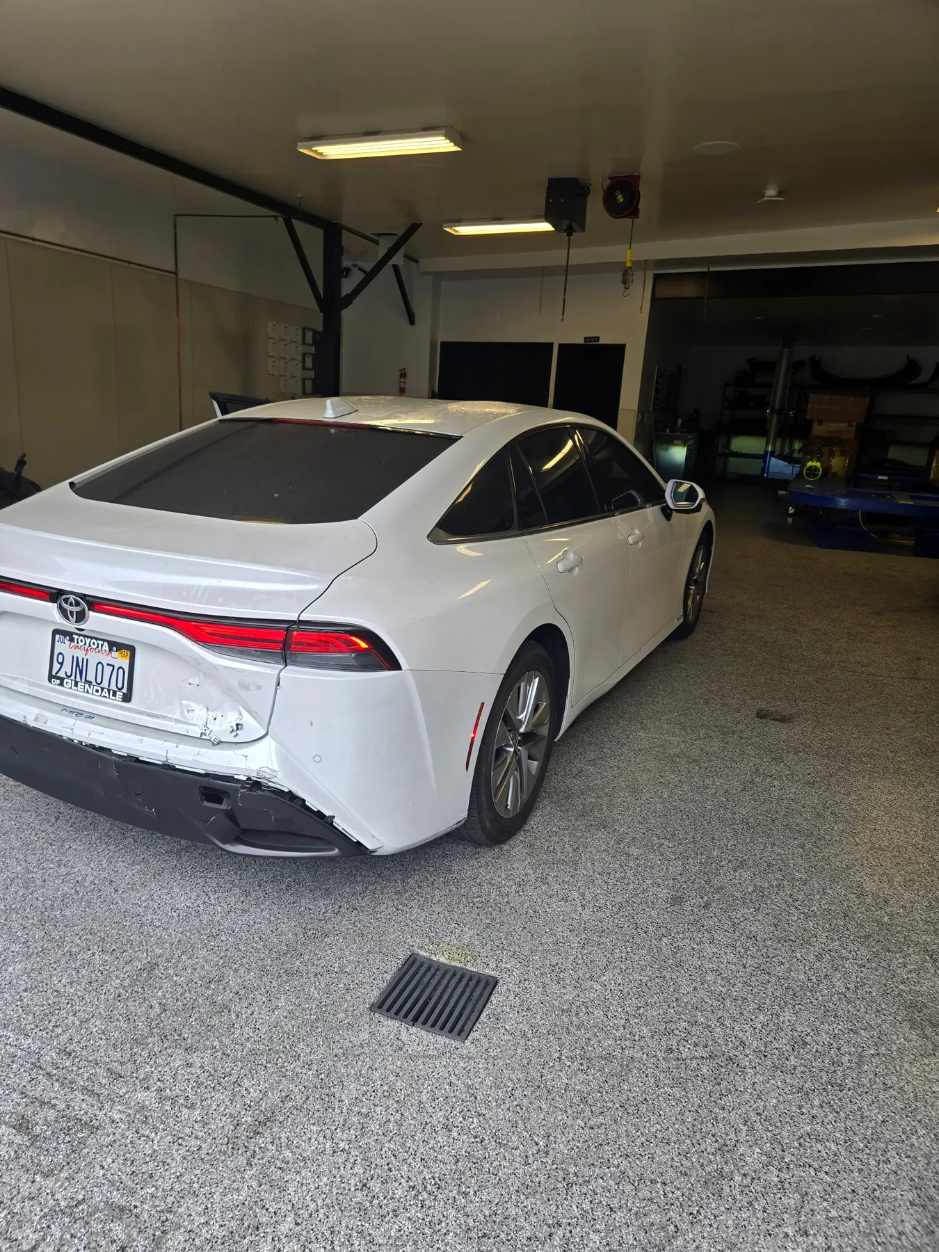 Toyota Mirai inside the Globus Auto Repair workshop